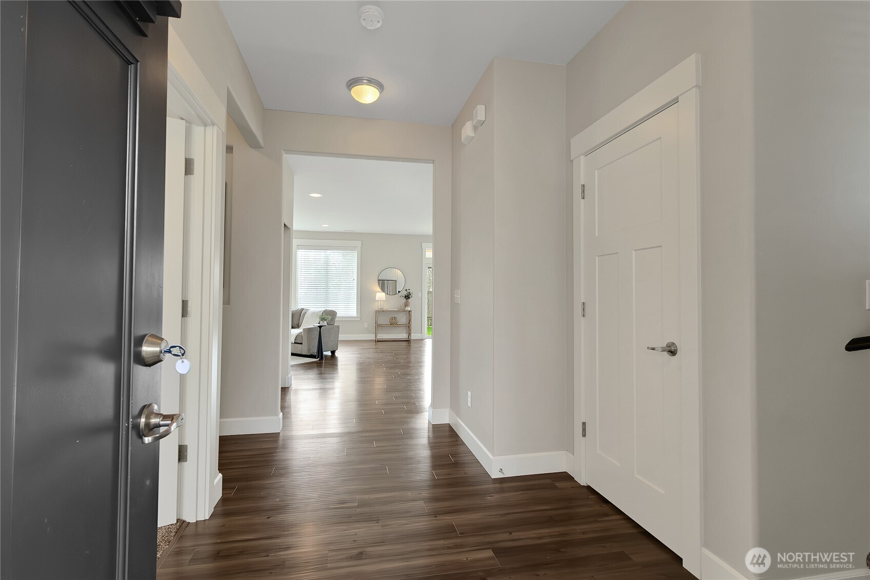 14925 Benton Loop Sumner, WA 98390 - Photo 5 of 40 a view of empty room with wooden floor