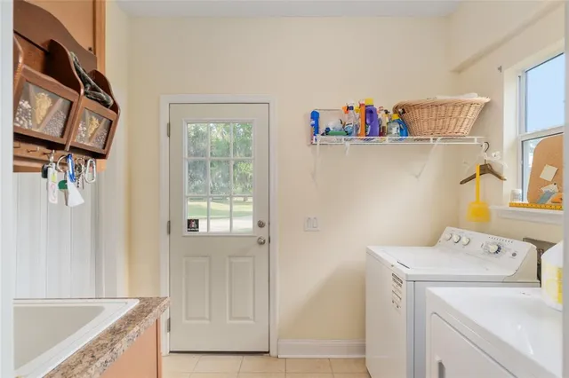 a bathroom with a bathtub and a sink