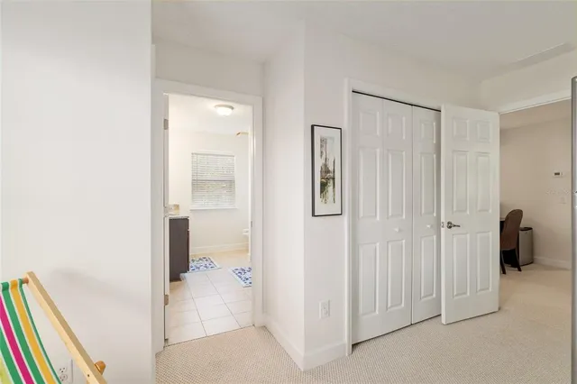 an aerial view of a house with outdoor space and street view