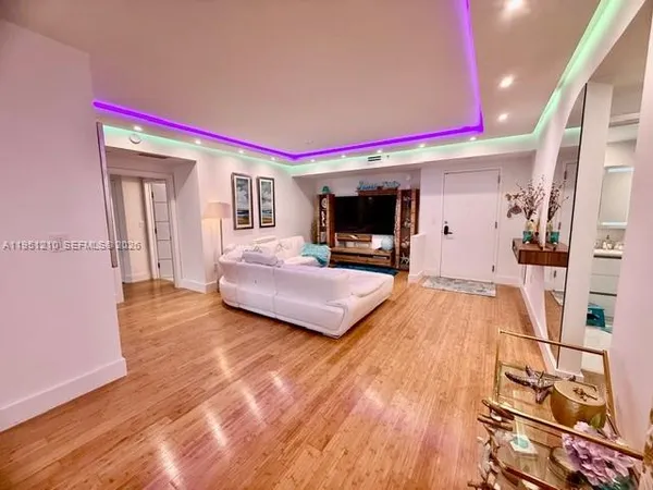 a living room with furniture and a rug