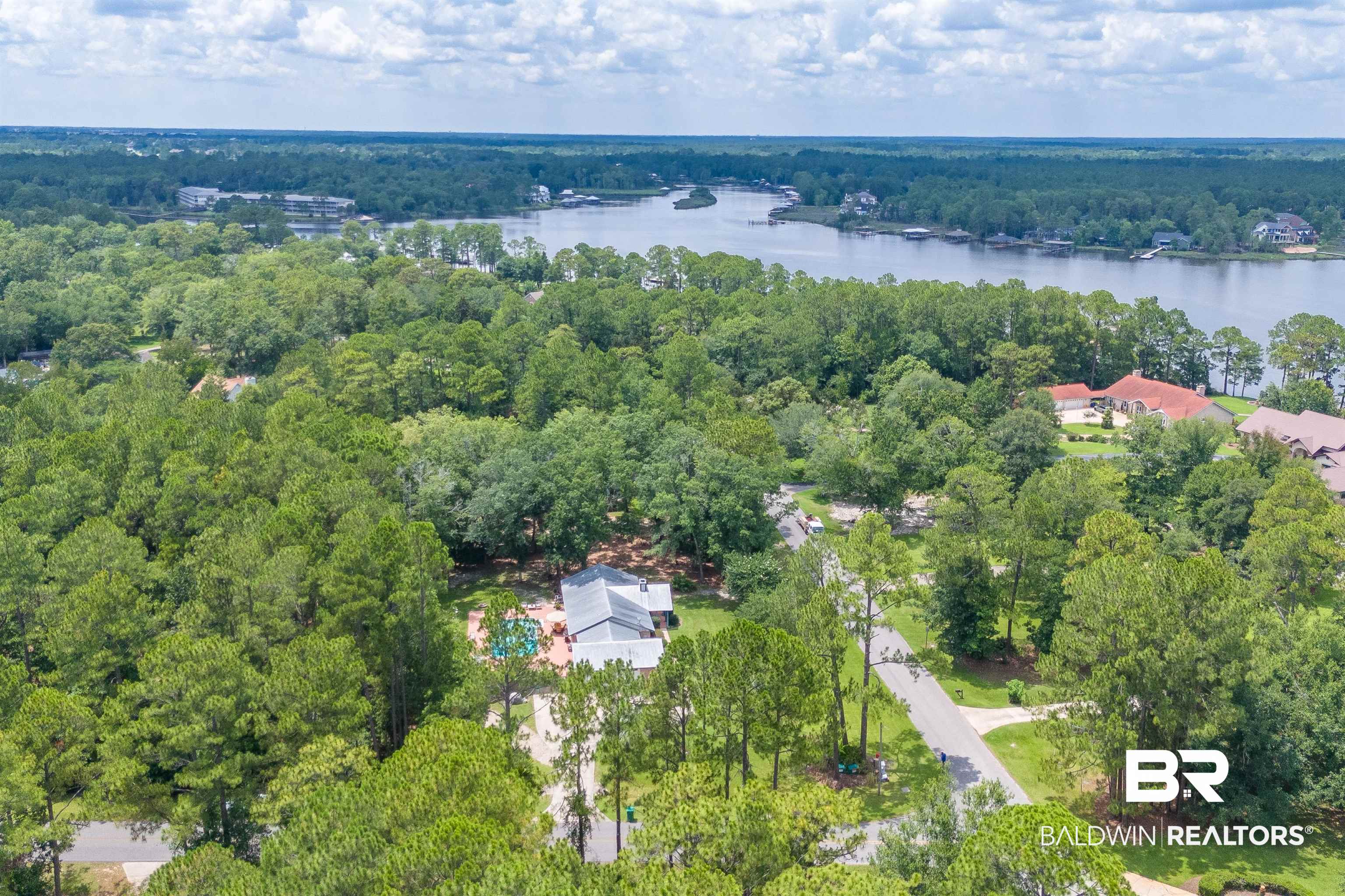 24551 Wolf Bay Drive Foley, AL 36535 - Photo 55 of 59 Aerial view of property and surrounding area with a nearby body of water