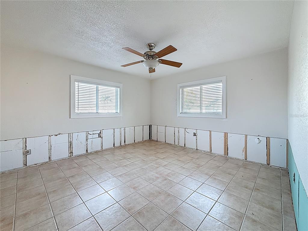 4869 Shell Stream Boulevard New Port Richey, FL 34652 - Photo 26 of 46 a view of an empty room with a window