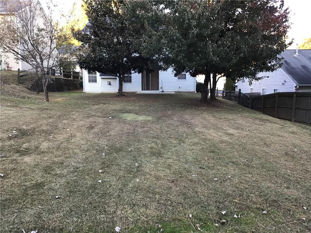 338 Alderman Trace Southwest Austell, GA 30168 - Photo 21 of 21 a view of a yard with a tree