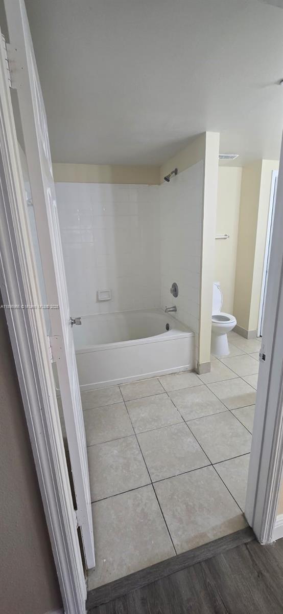 230 Southwest 117th Terrace, Unit 11208 Pembroke Pines, FL 33025 - Photo 13 of 28 a bathroom with a sink and a glass door shower