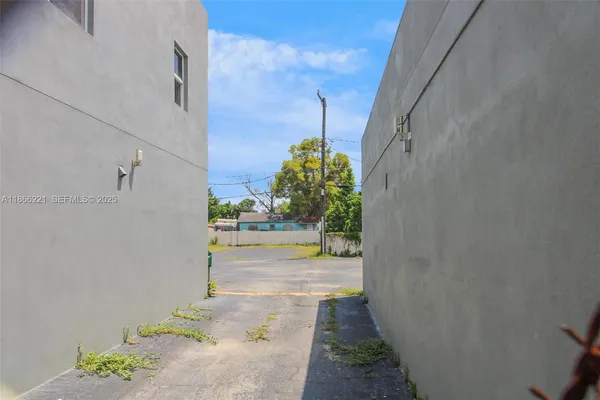 a view of street with parked cars