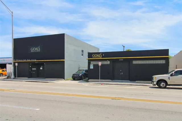 a car parked in front of a building
