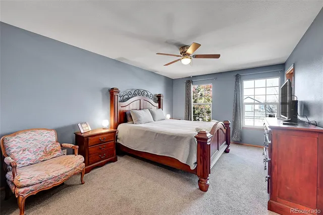 a kitchen with stainless steel appliances a refrigerator and a stove top oven