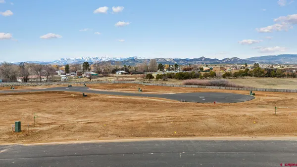 a view of an ocean and city