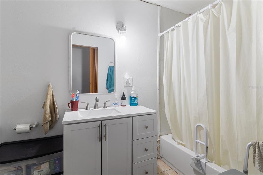 575 Bronco Road Zolfo Springs, FL 33890 - Photo 15 of 22 a bathroom with a sink and a mirror