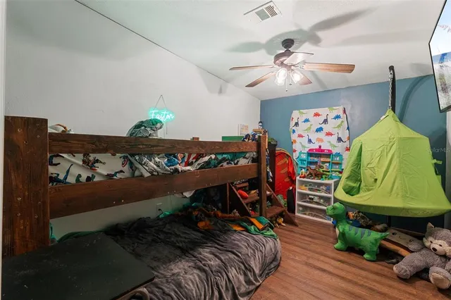 a view of a entryway with furniture and wooden floor