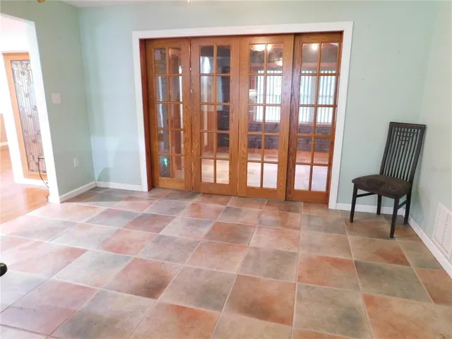 an empty room with windows