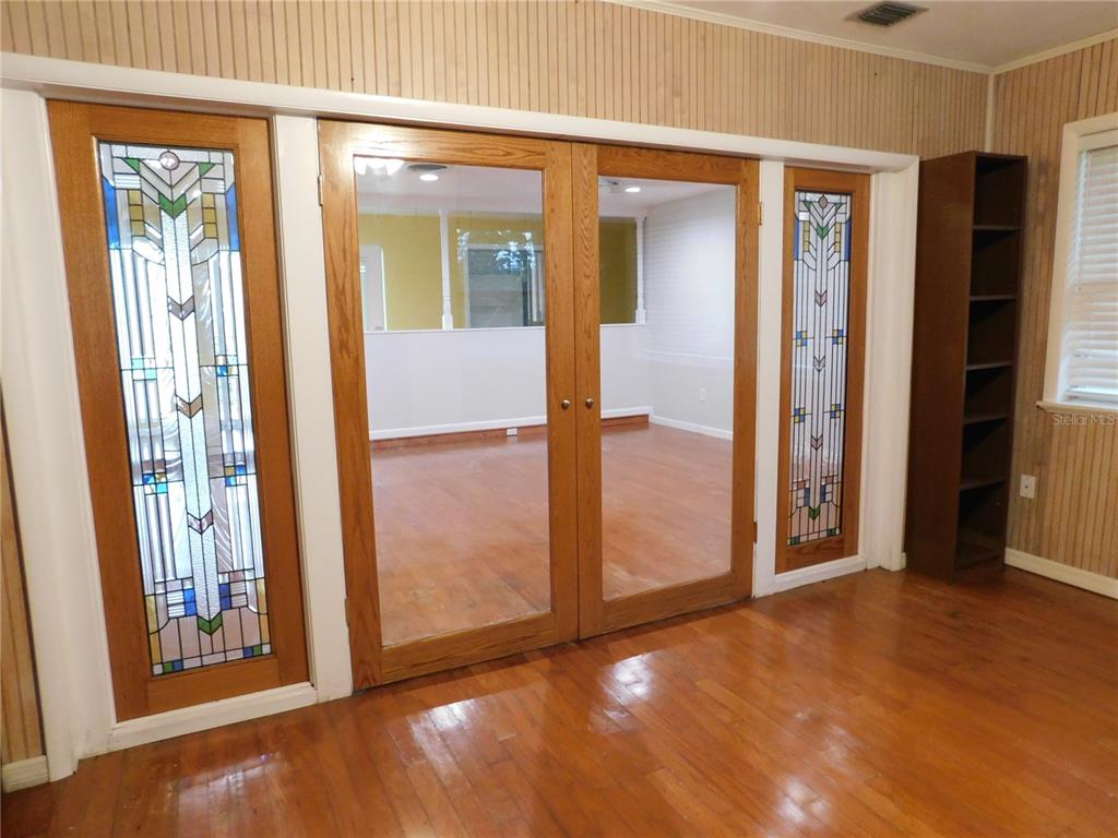 888 Forest Glen Road Clearwater, FL 33765 - Photo 15 of 61 an empty room with windows