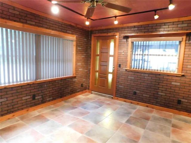 a view of an empty room with a balcony