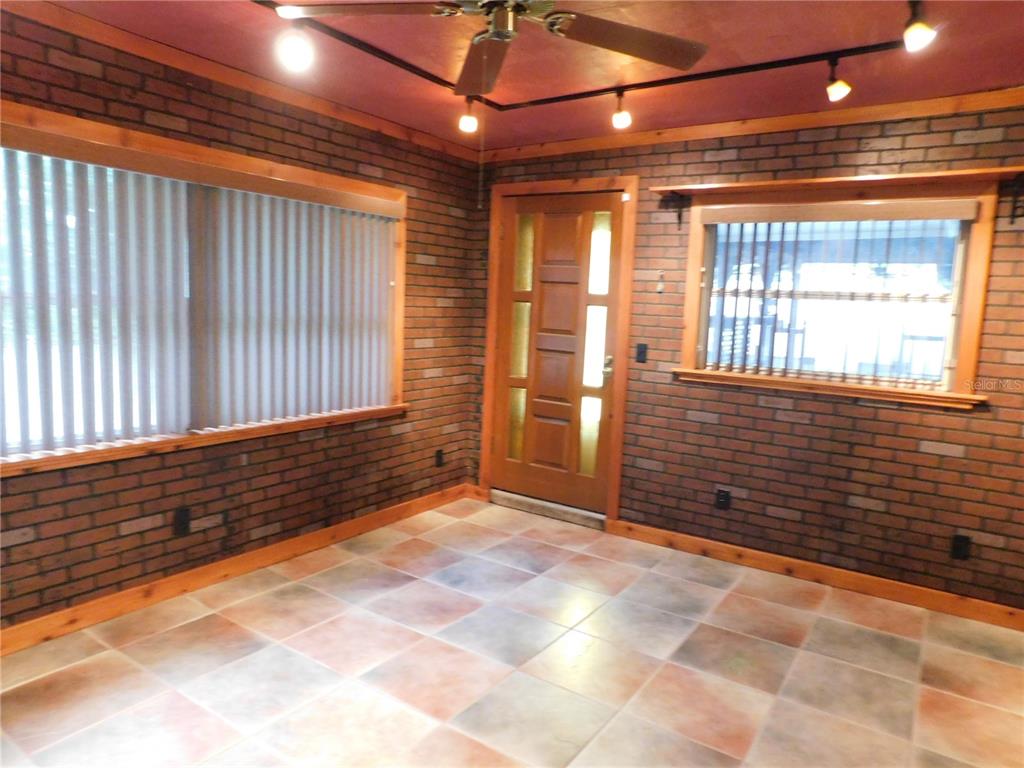 888 Forest Glen Road Clearwater, FL 33765 - Photo 19 of 61 a view of an empty room with a window