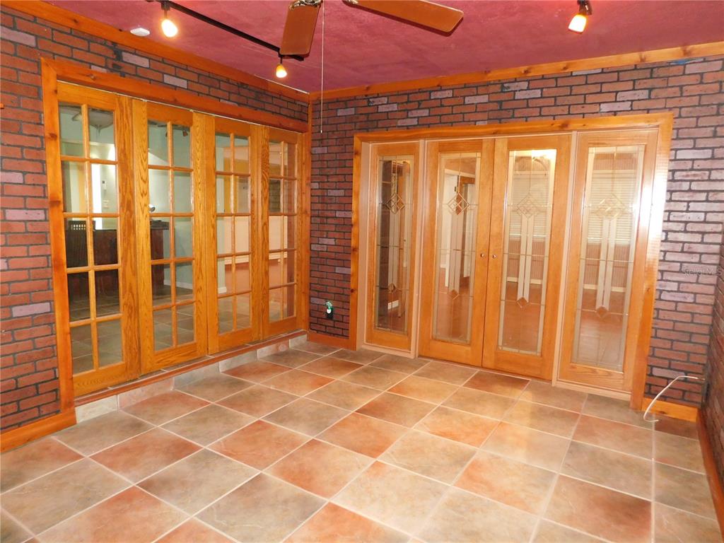 888 Forest Glen Road Clearwater, FL 33765 - Photo 20 of 61 a view of a bathroom with a shower