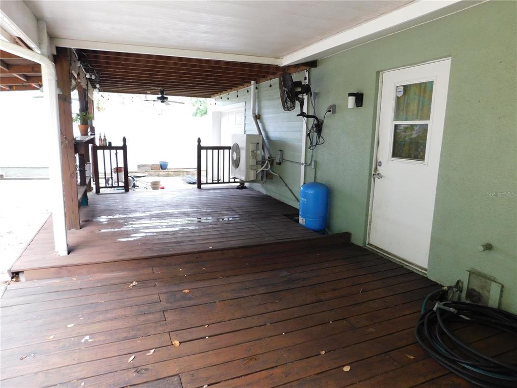 888 Forest Glen Road Clearwater, FL 33765 - Photo 53 of 61 a view of empty room with wooden floor and fan
