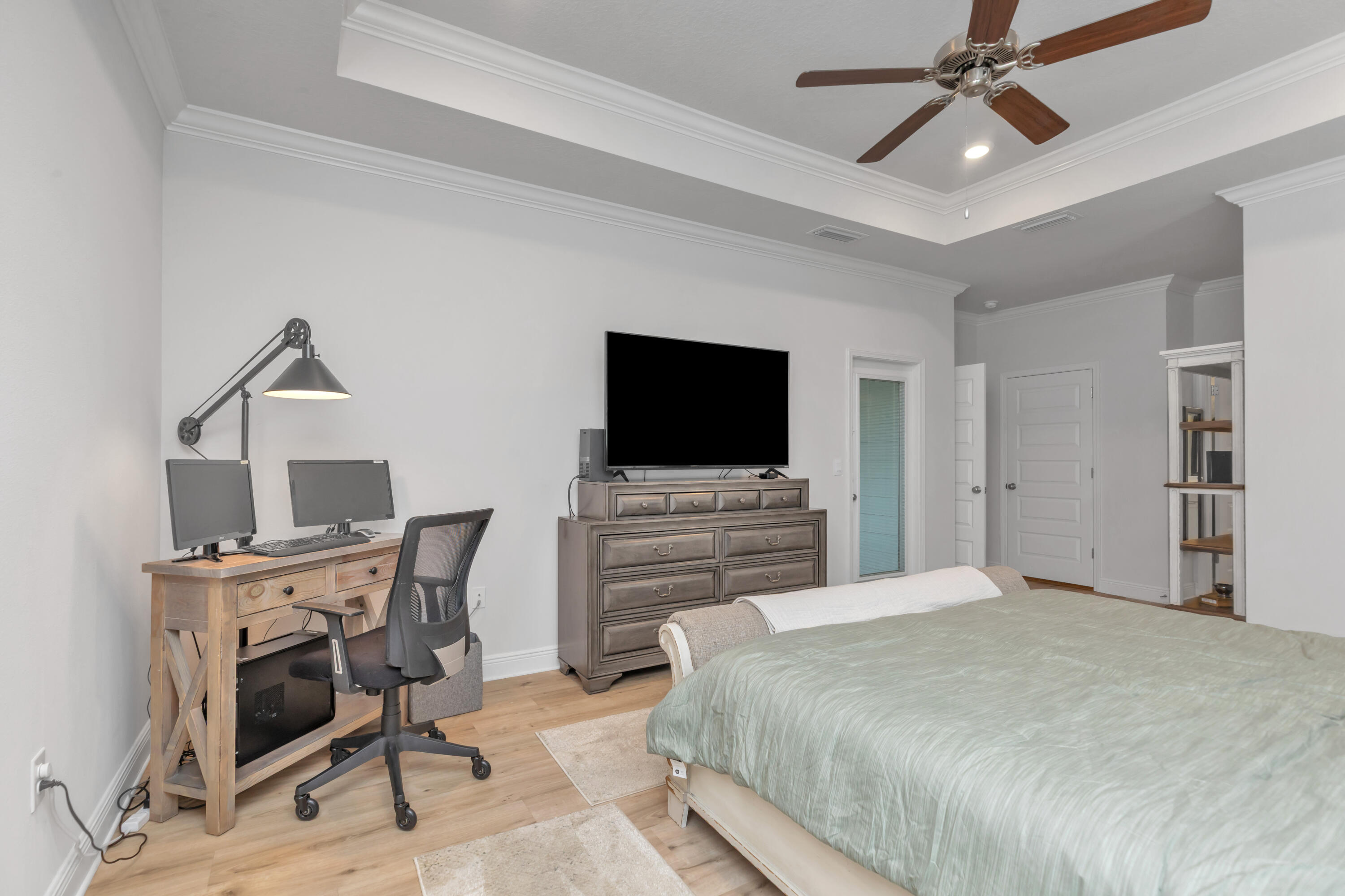 18 Hammock Circle Freeport, FL 32439 - Photo 24 of 50 a bedroom with a bed and a flat screen tv