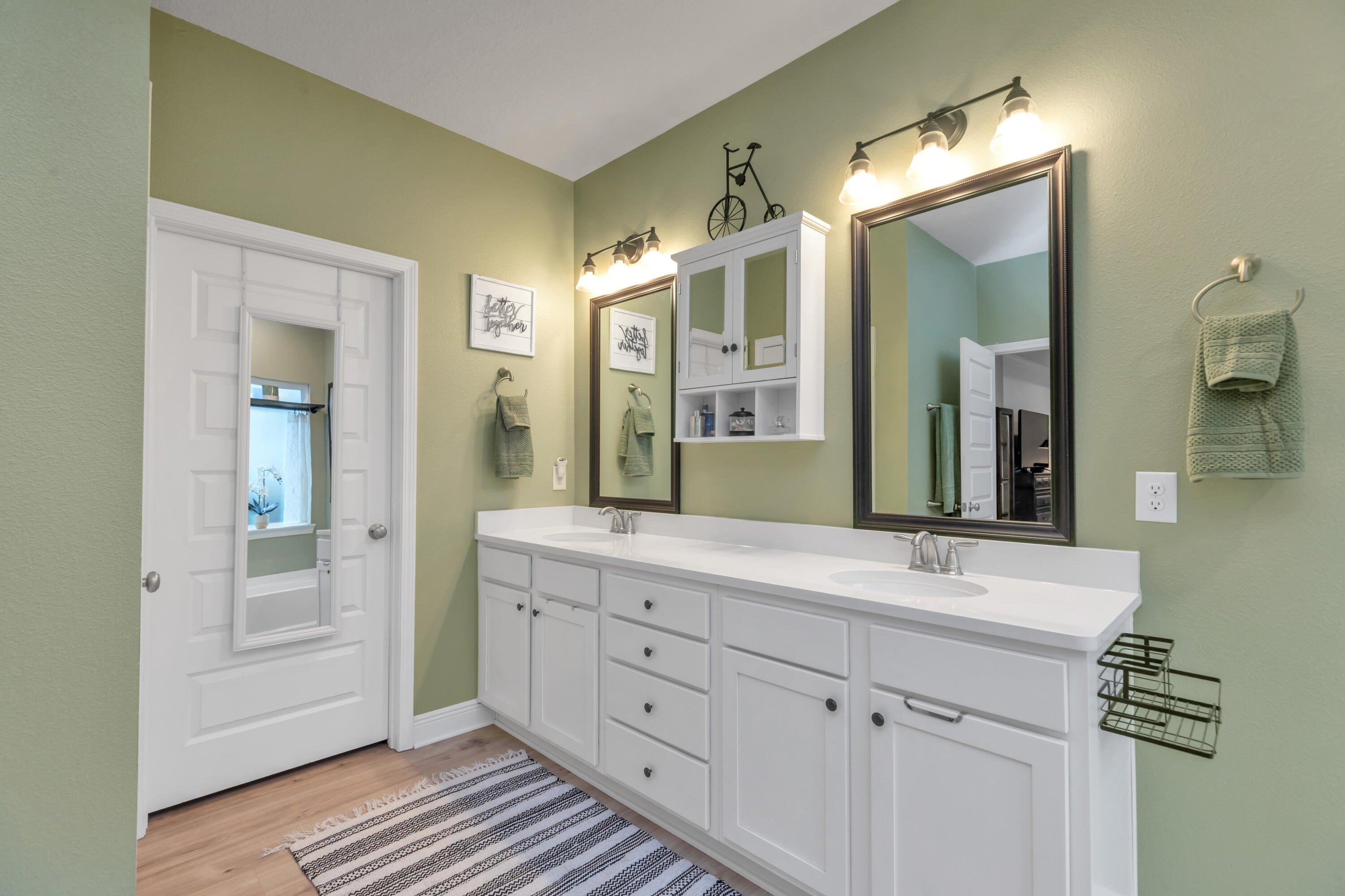 18 Hammock Circle Freeport, FL 32439 - Photo 28 of 50 a spacious bathroom with a shower sink and mirror