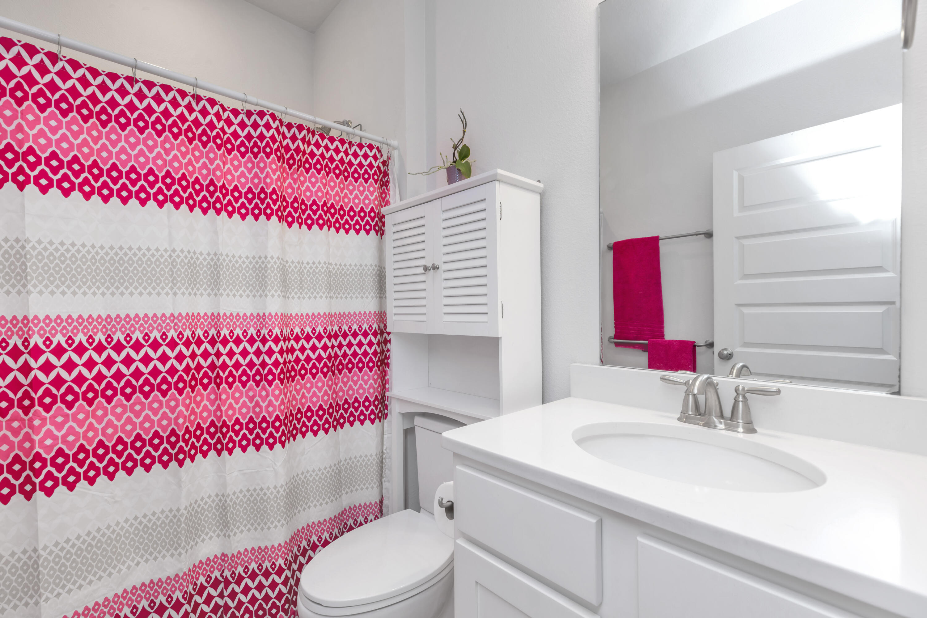 18 Hammock Circle Freeport, FL 32439 - Photo 34 of 50 a bathroom with a sink toilet and a mirror