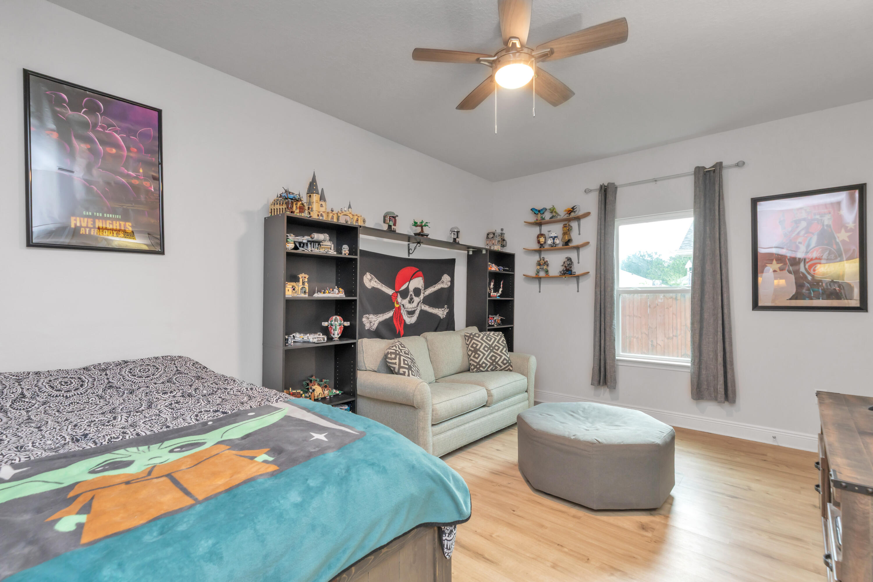 18 Hammock Circle Freeport, FL 32439 - Photo 36 of 50 a bedroom with furniture and a fireplace