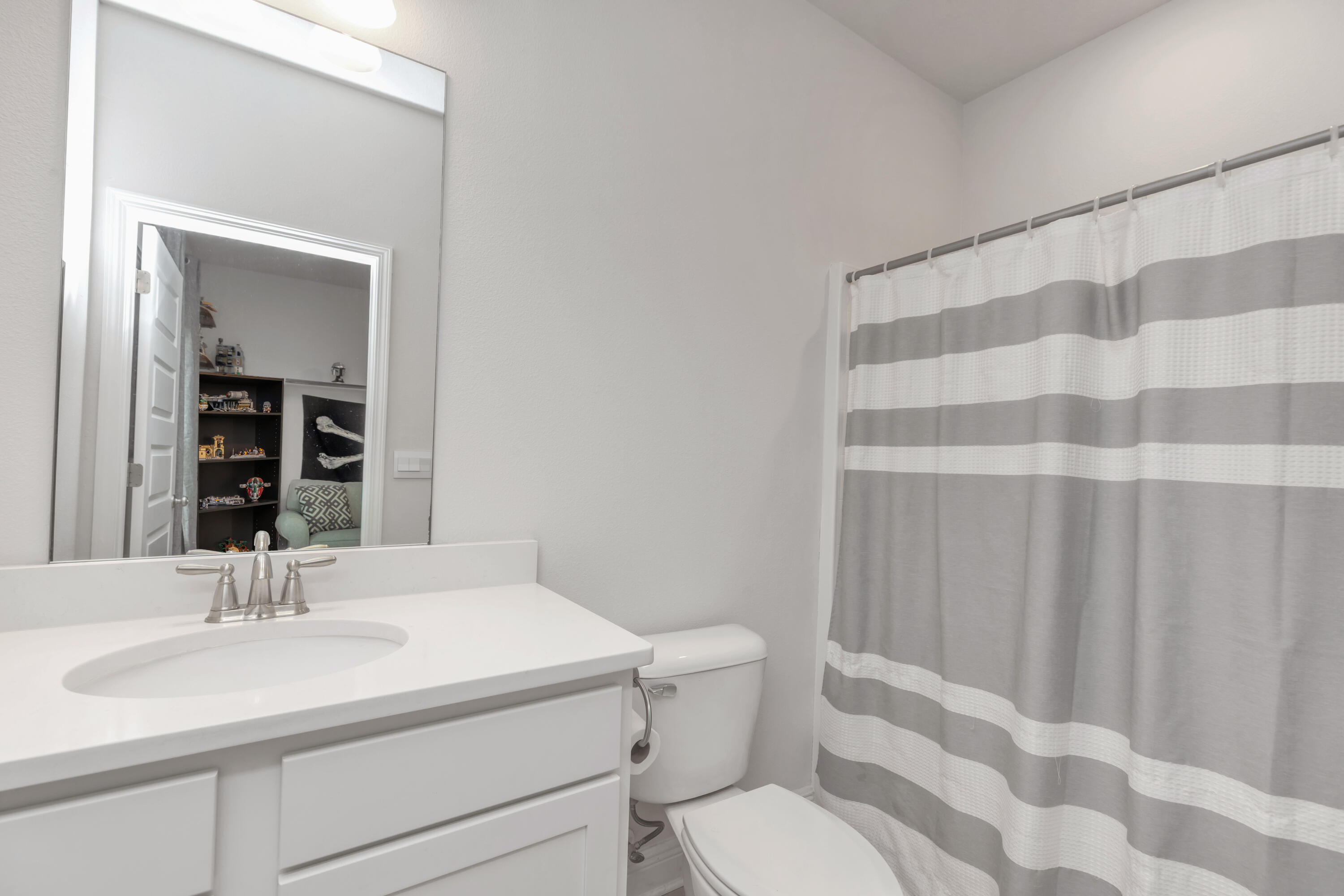 18 Hammock Circle Freeport, FL 32439 - Photo 39 of 50 a bathroom with a sink toilet and shower