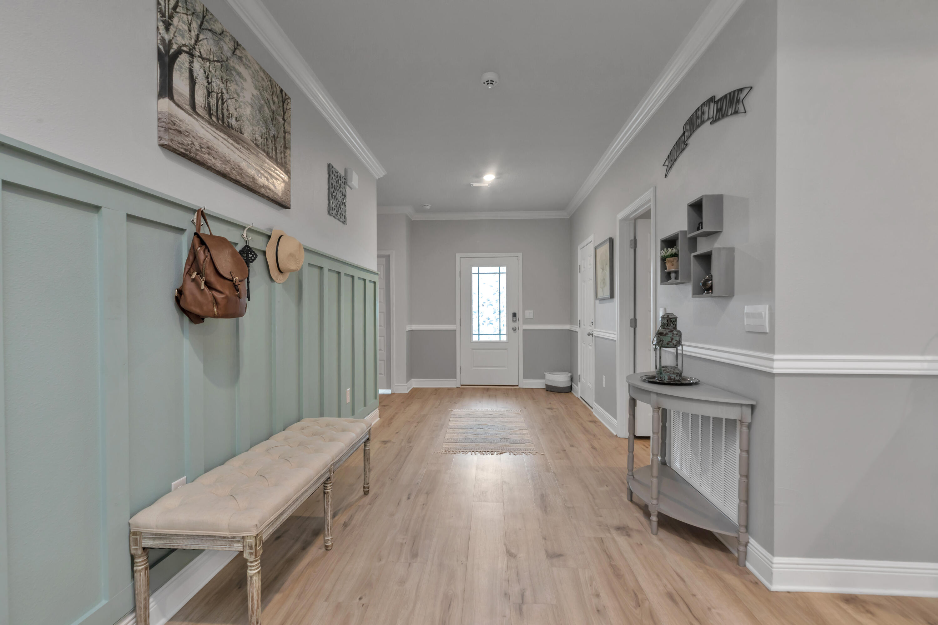 18 Hammock Circle Freeport, FL 32439 - Photo 43 of 50 a view of a hallway with wooden floor and staircase