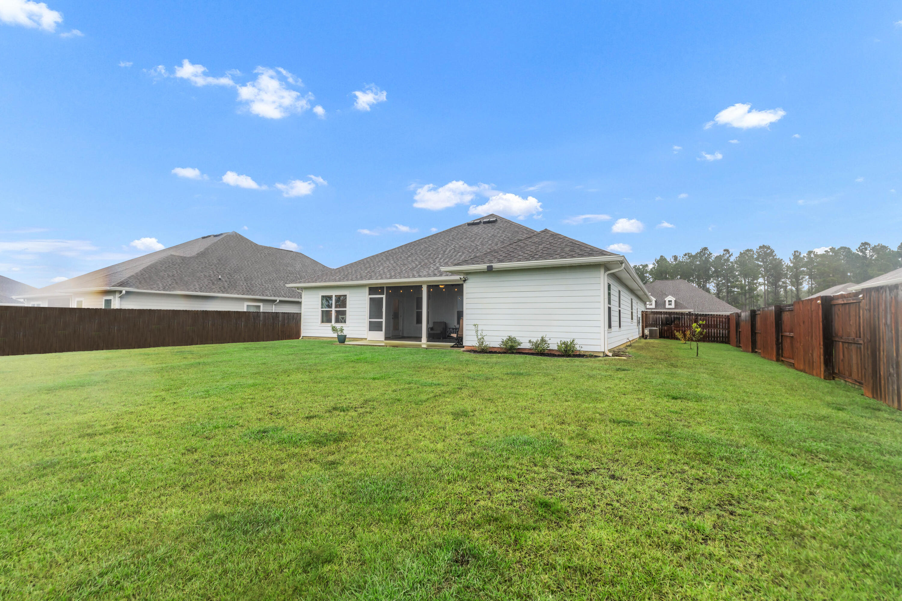 18 Hammock Circle Freeport, FL 32439 - Photo 48 of 50 a front view of a house with garden