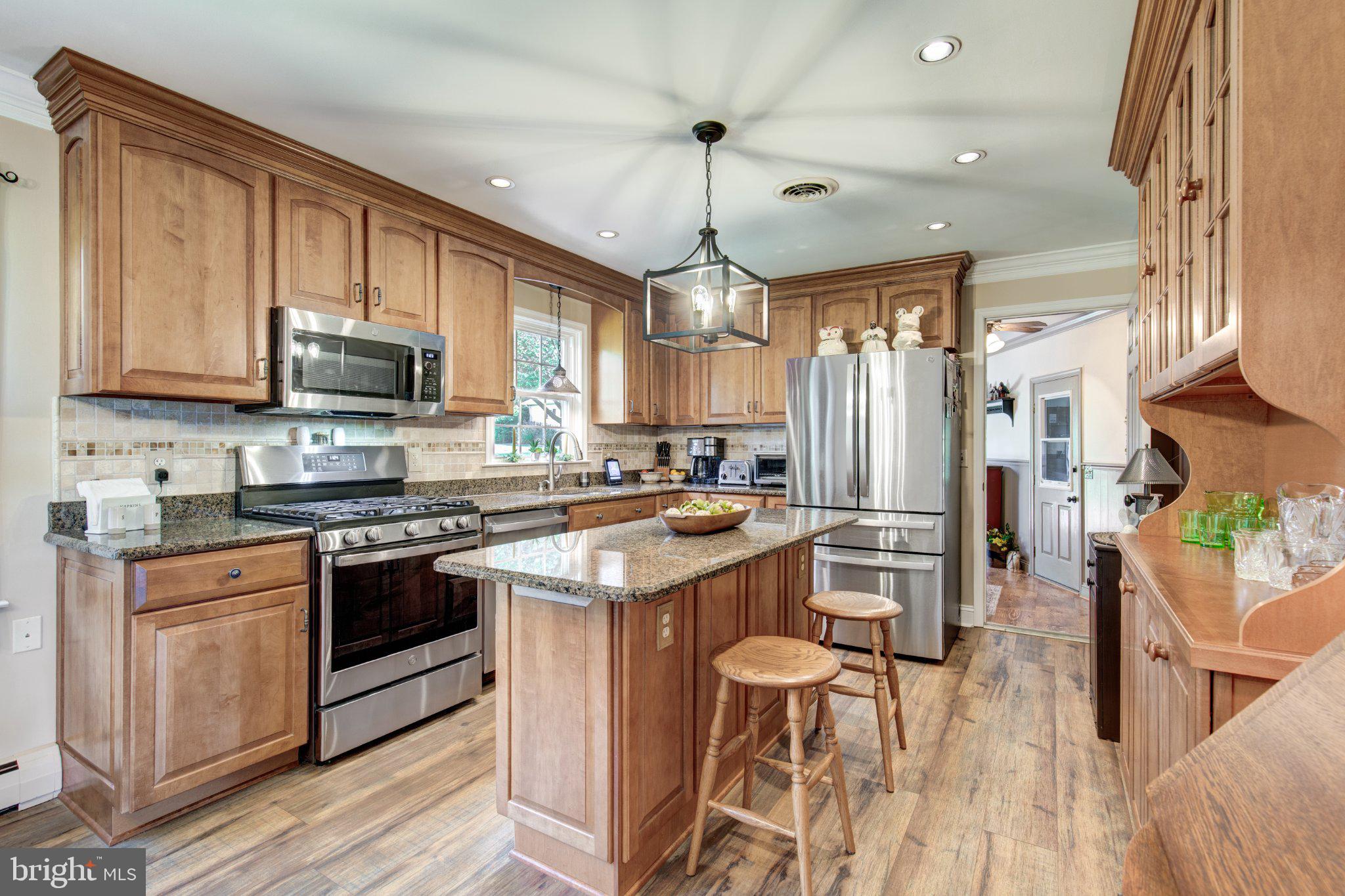 4818 Hoffmanville Road Manchester, MD 21102 - Photo 5 of 71 Totally remodeled kitchen with maple cabinetry!