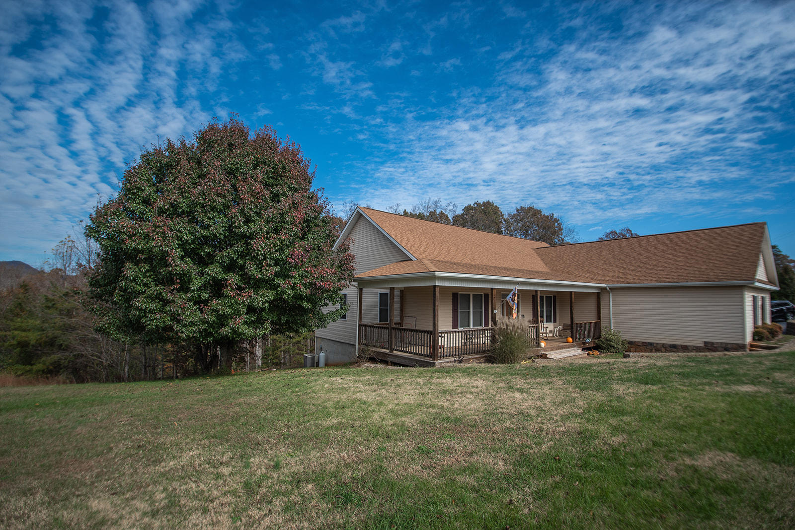 front view of a house with a yard