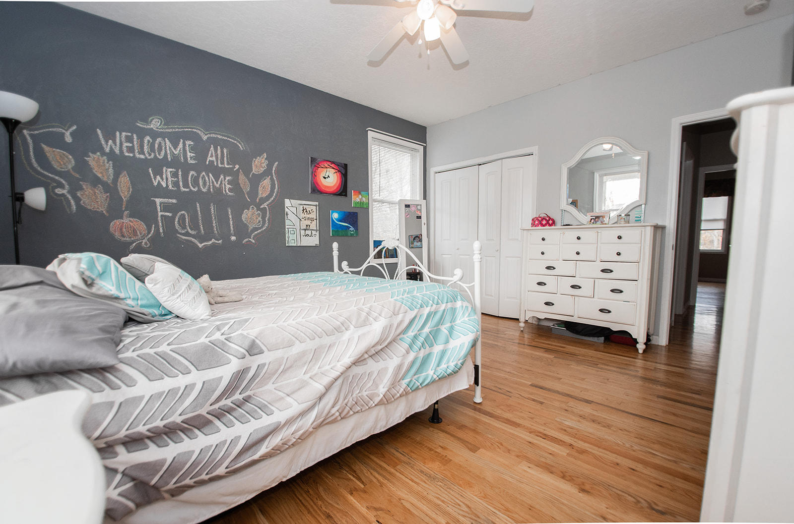 1056 Oyler Road Hardy, VA 24101 - Photo 24 of 45 a bedroom with a bed and a chandelier