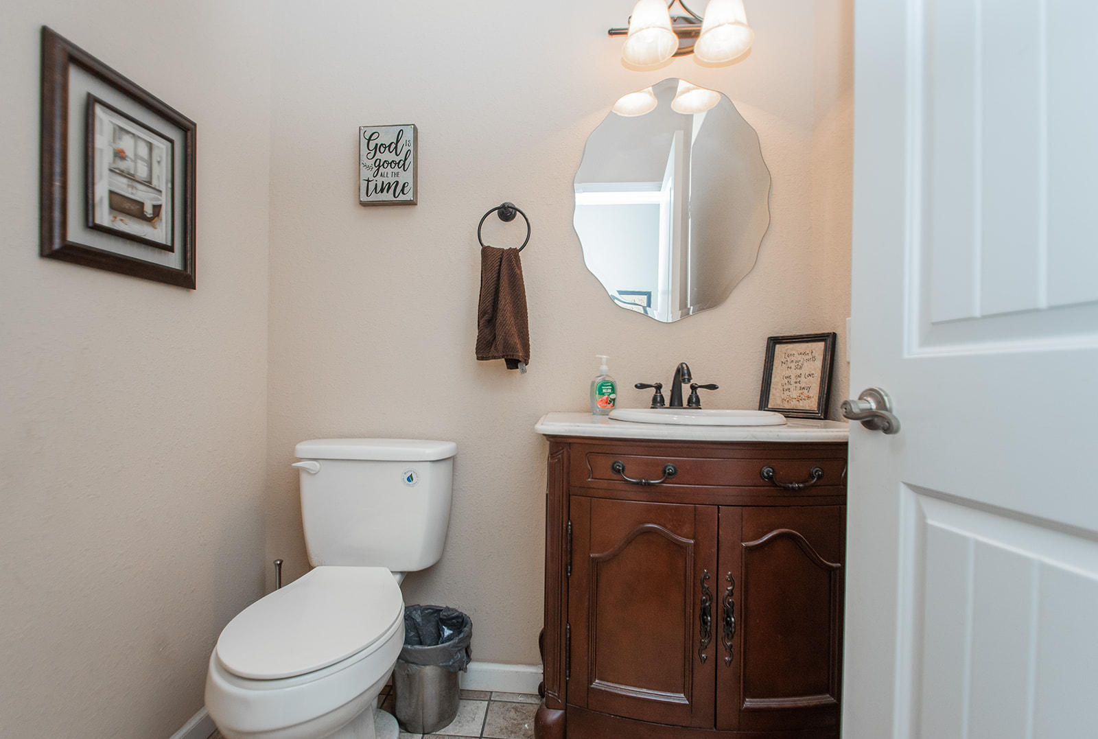 1056 Oyler Road Hardy, VA 24101 - Photo 31 of 45 a bathroom with a toilet a sink and mirror