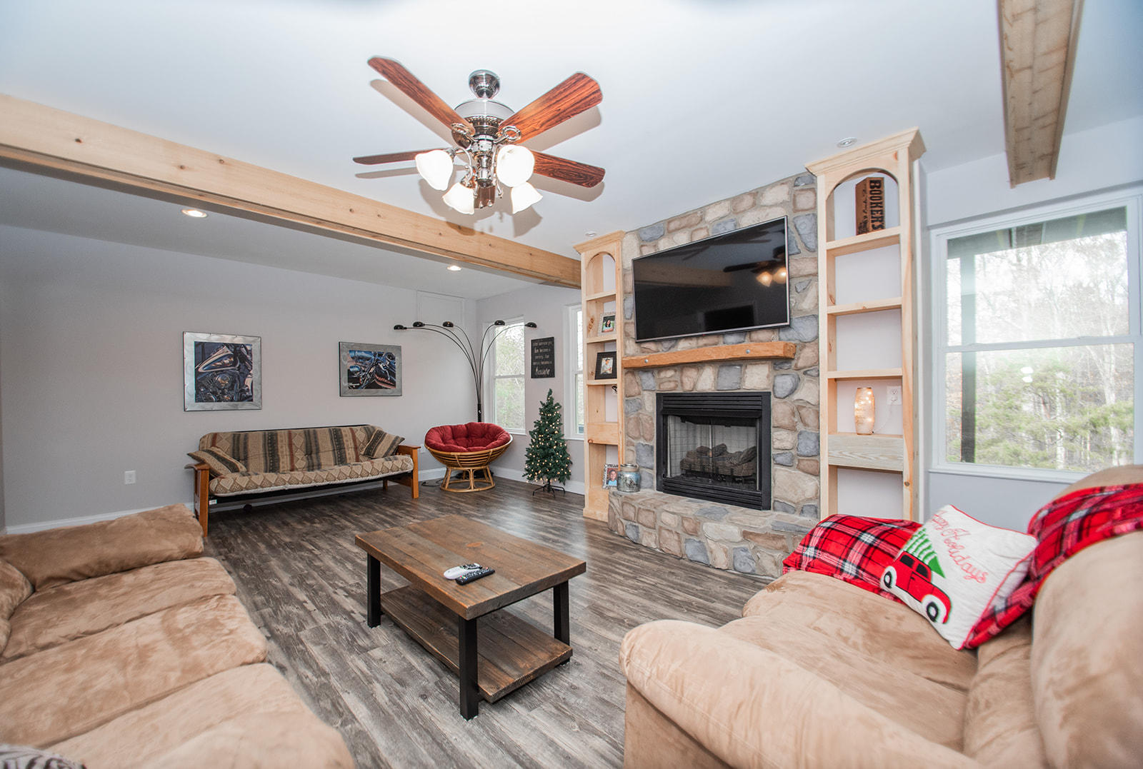 1056 Oyler Road Hardy, VA 24101 - Photo 35 of 45 a living room with furniture fireplace and flat screen tv