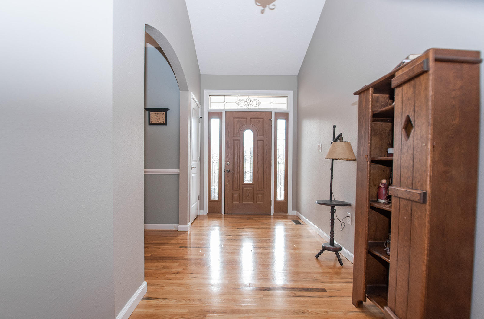 1056 Oyler Road Hardy, VA 24101 - Photo 8 of 45 a view of a hallway with wooden floor and a livingroom