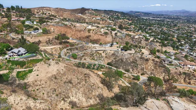 a view of a city with mountain