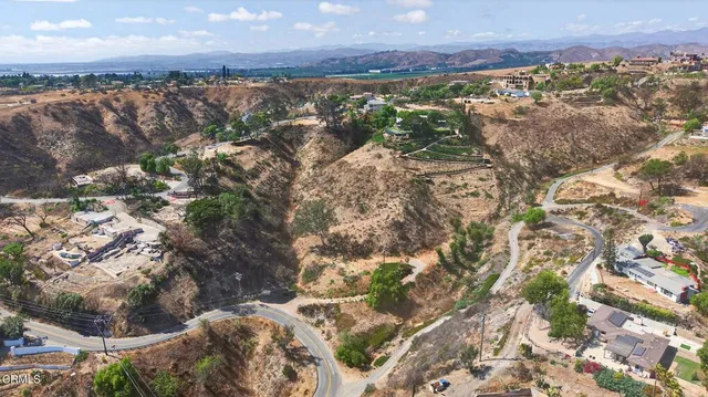 a view of lake with yard