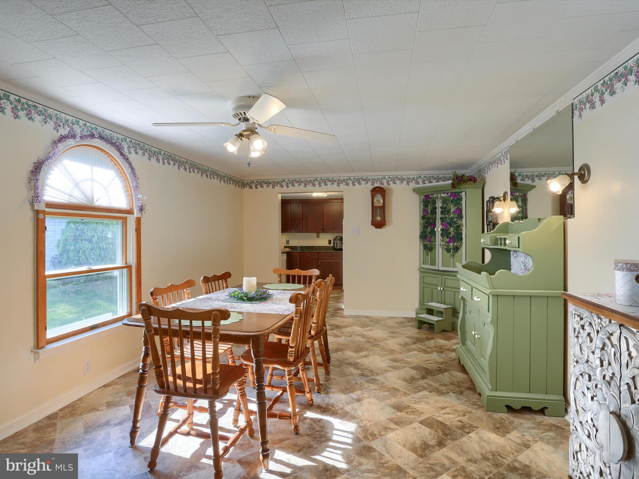 5333 Spruce Road Fayetteville, PA 17222 - Photo 13 of 40 a view of a dining room with furniture and a window