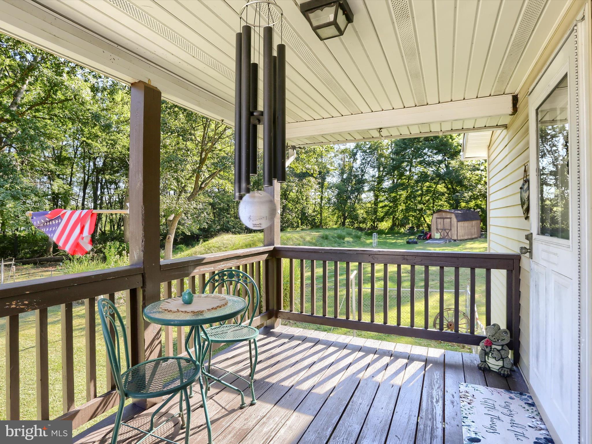 5333 Spruce Road Fayetteville, PA 17222 - Photo 35 of 40 a view of a deck with wooden floor and outdoor seating