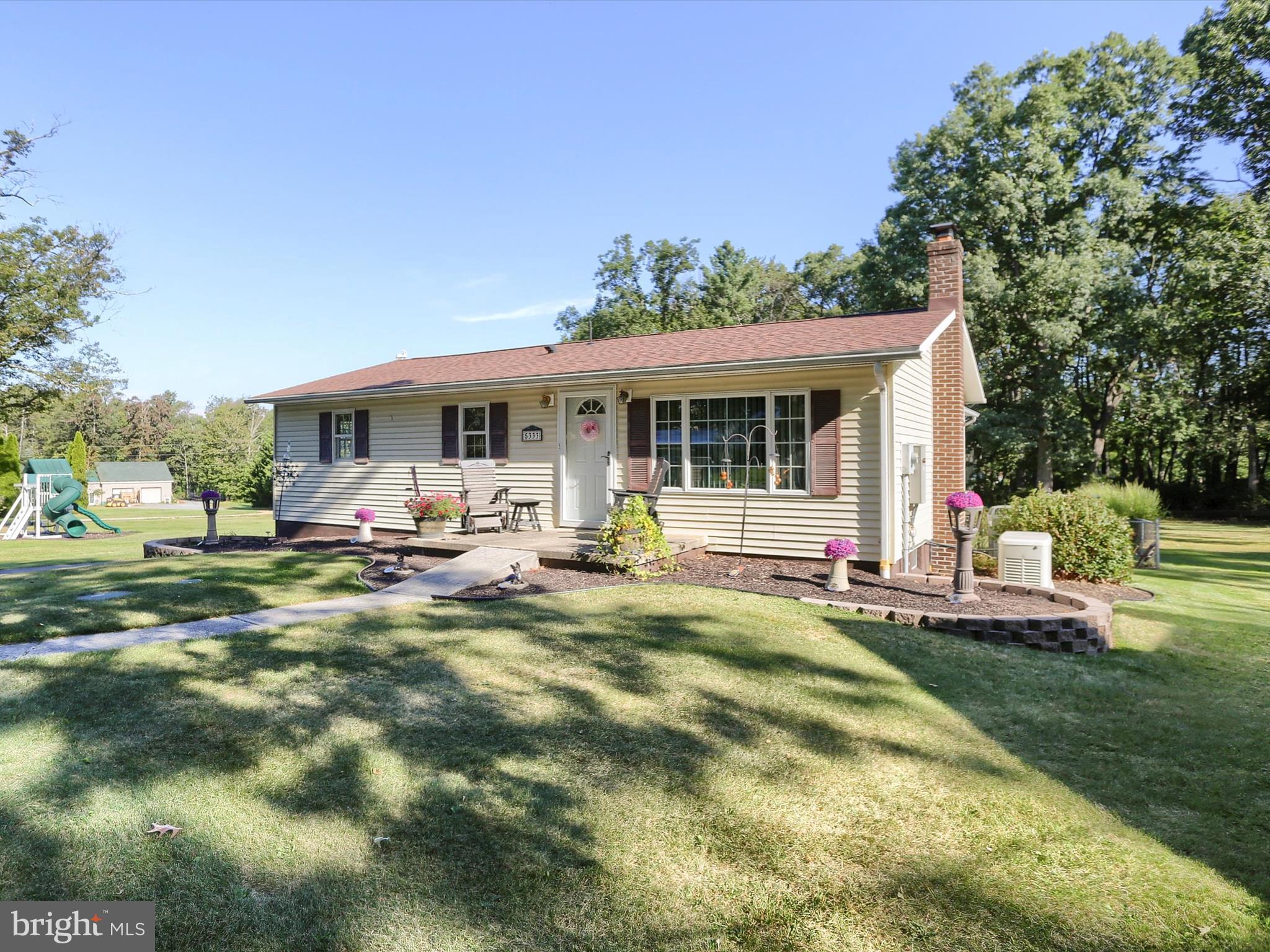 5333 Spruce Road Fayetteville, PA 17222 - Photo 4 of 40 a view of a house with swimming pool and porch with furniture