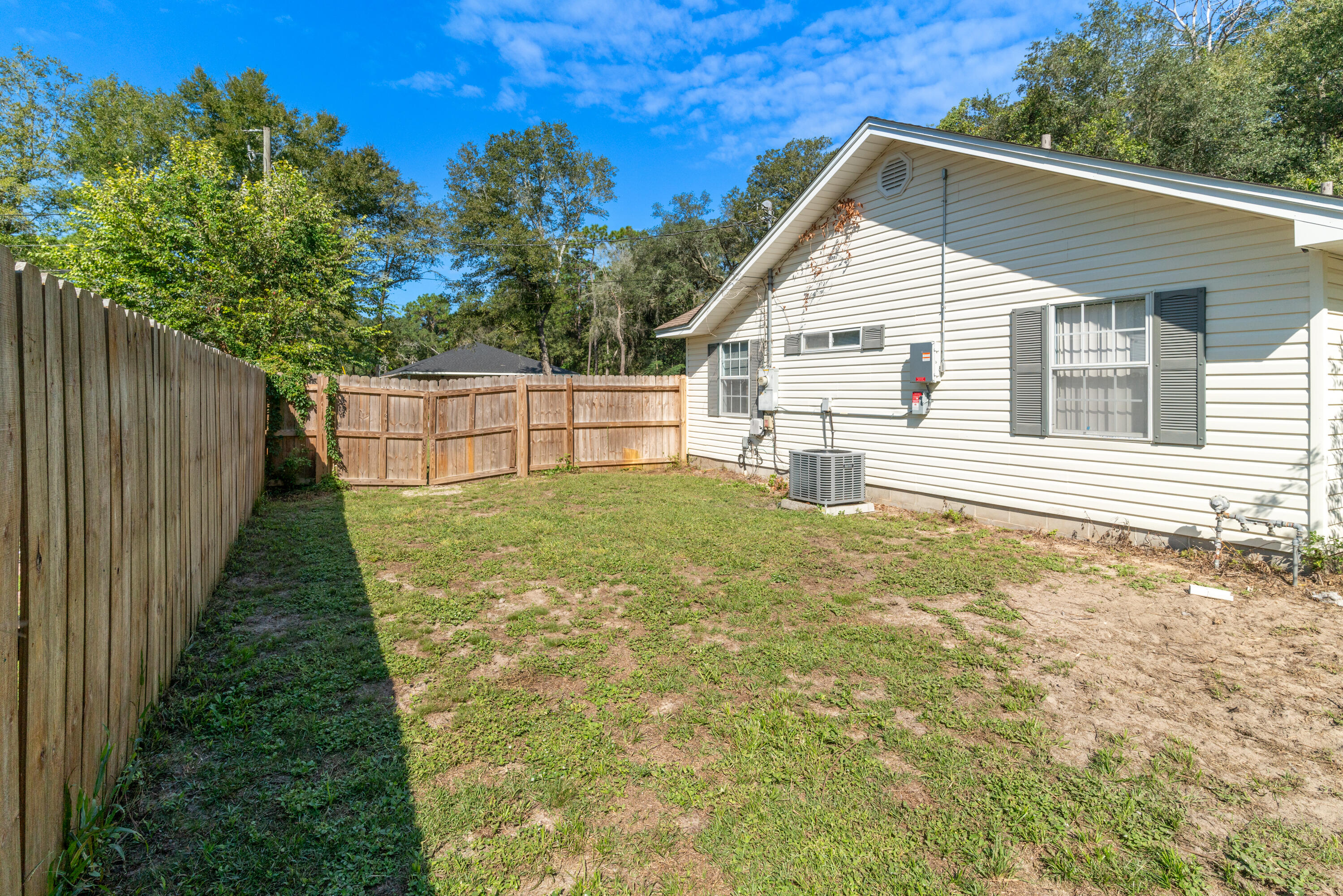 1530 Heritage Road Fort Walton Beach, FL 32547 - Photo 12 of 37 a view of a backyard with a garden