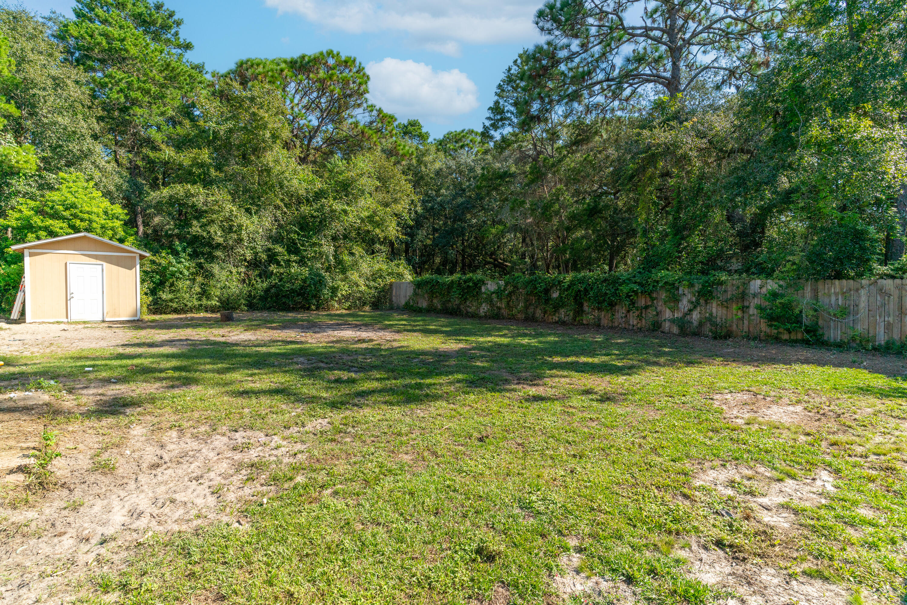 1530 Heritage Road Fort Walton Beach, FL 32547 - Photo 13 of 37 a view of a house with a swimming pool