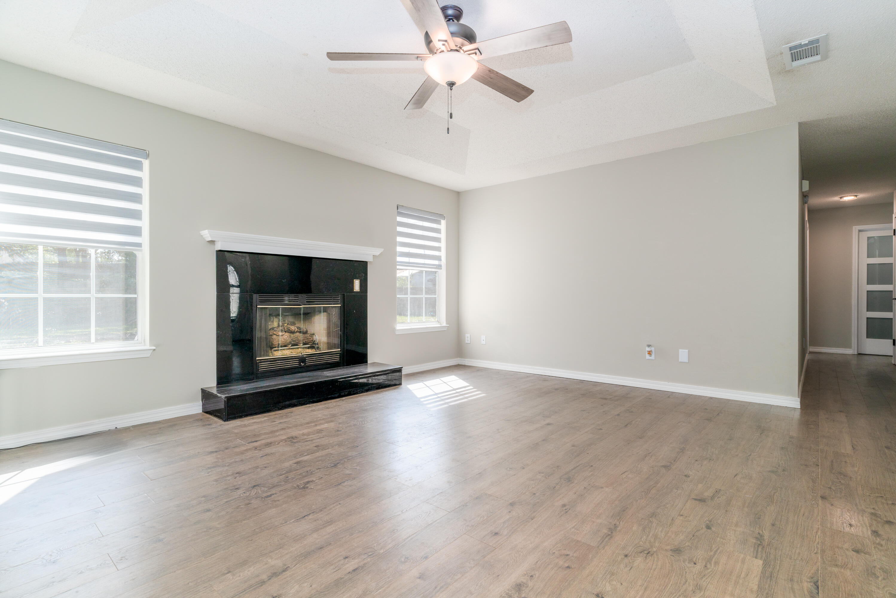 1530 Heritage Road Fort Walton Beach, FL 32547 - Photo 18 of 37 a view of an empty room with window and fireplace