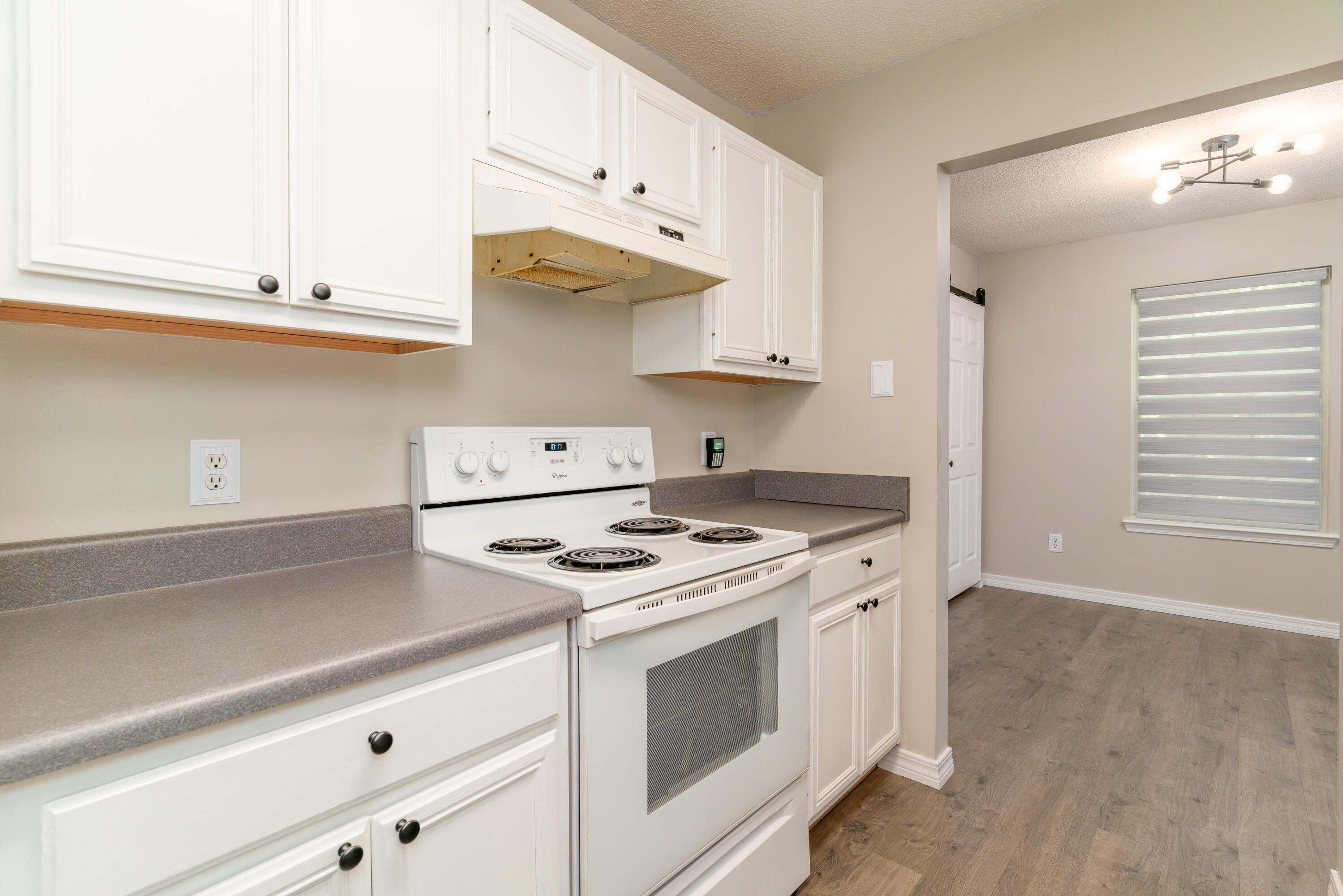 1530 Heritage Road Fort Walton Beach, FL 32547 - Photo 23 of 37 a white stove top oven sitting inside of a kitchen