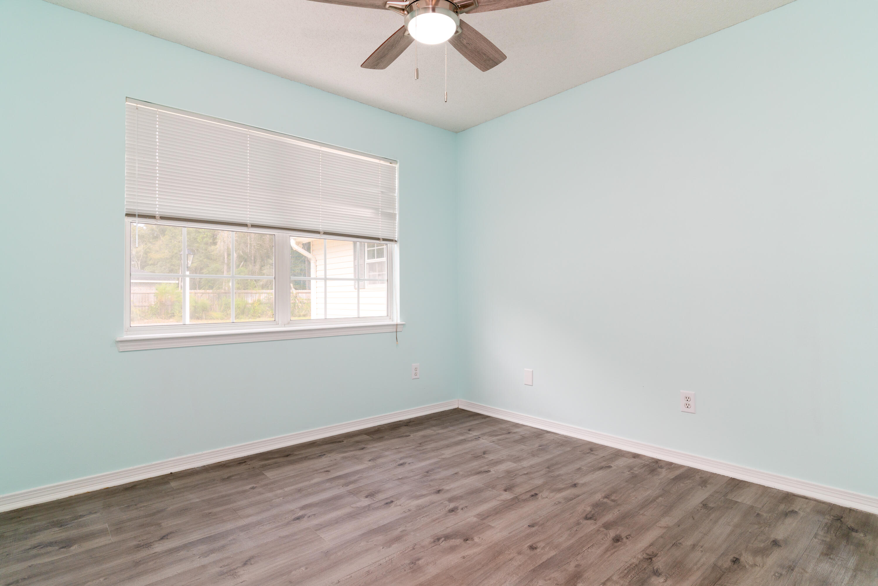 1530 Heritage Road Fort Walton Beach, FL 32547 - Photo 30 of 37 an empty room with a window and a fan