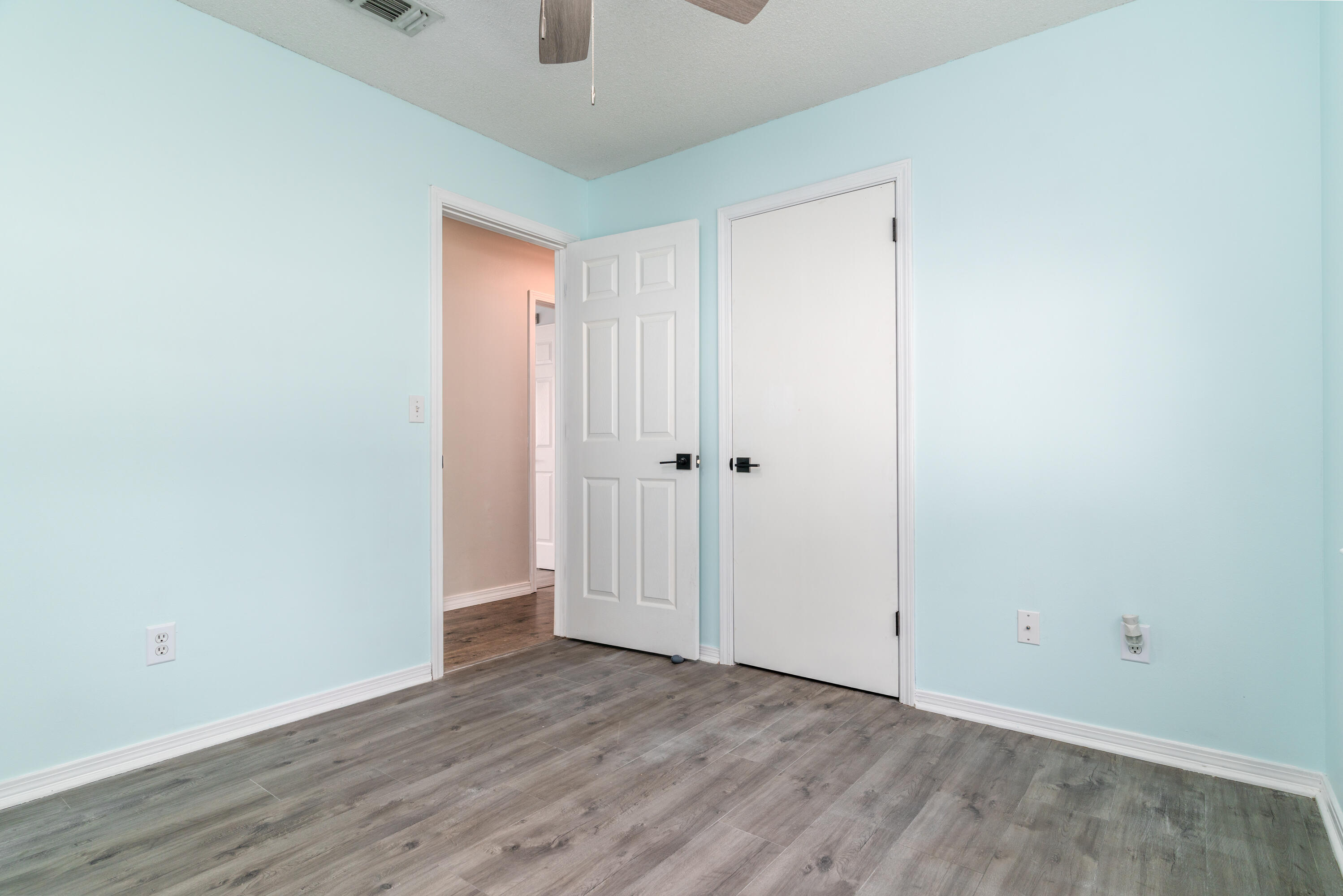 1530 Heritage Road Fort Walton Beach, FL 32547 - Photo 31 of 37 a view of an empty room with wooden floor