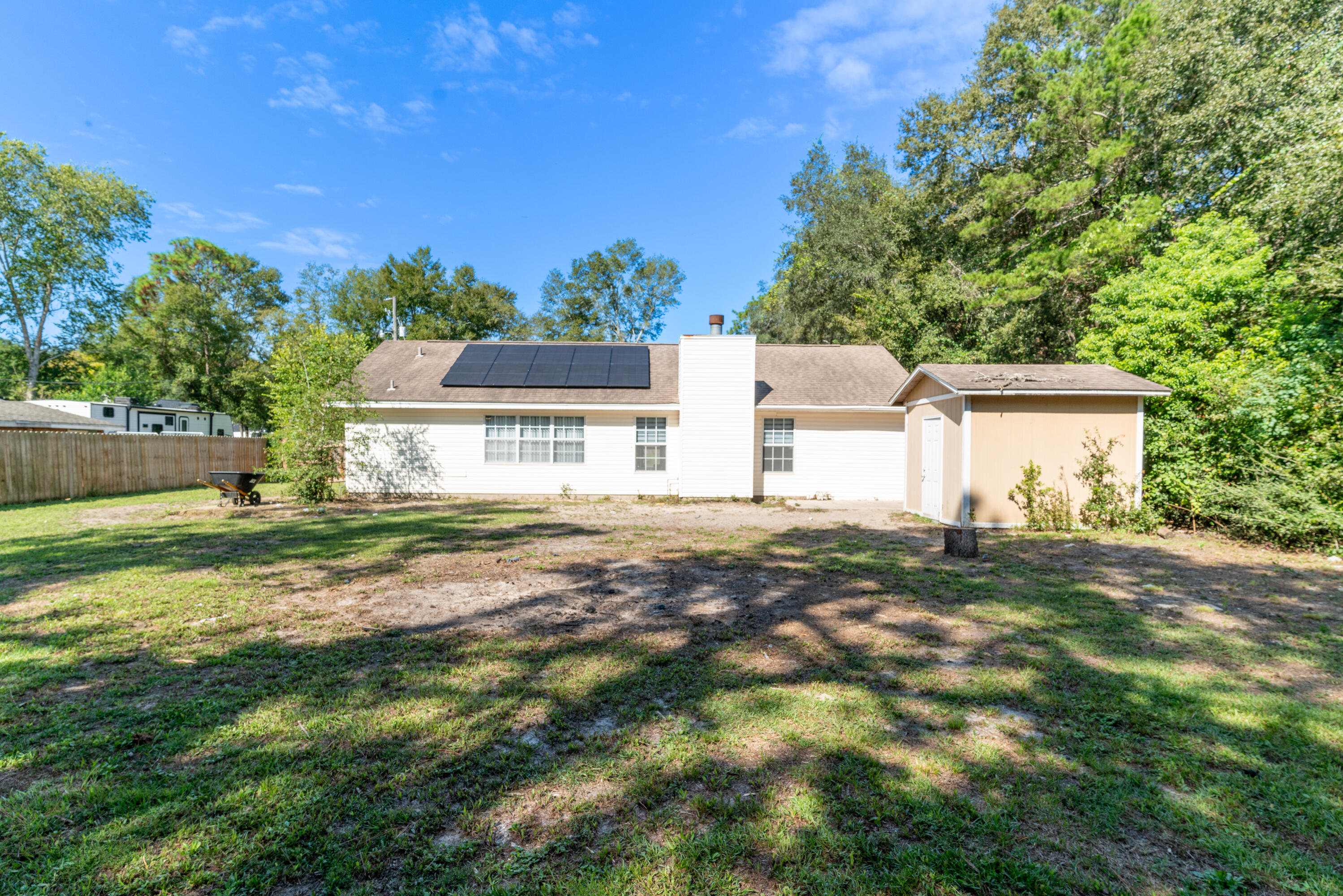 1530 Heritage Road Fort Walton Beach, FL 32547 - Photo 10 of 37 a front view of a house with a garden