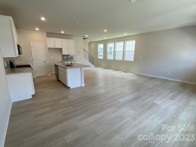 933 Cobbled Way, Unit 35 Fort Mill, SC 29715 - Photo 13 of 30 a large kitchen with a lot of counter top space