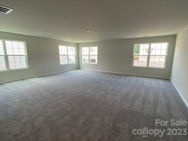 933 Cobbled Way, Unit 35 Fort Mill, SC 29715 - Photo 24 of 30 a view of an empty room with a window