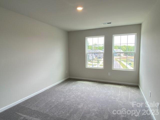 933 Cobbled Way, Unit 35 Fort Mill, SC 29715 - Photo 27 of 30 a view of an empty room with a window
