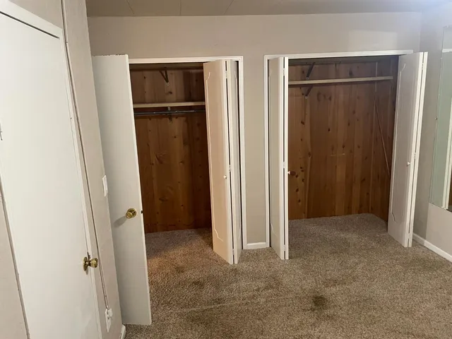 an empty room with closet