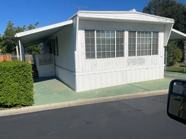 a view of backyard with outdoor space